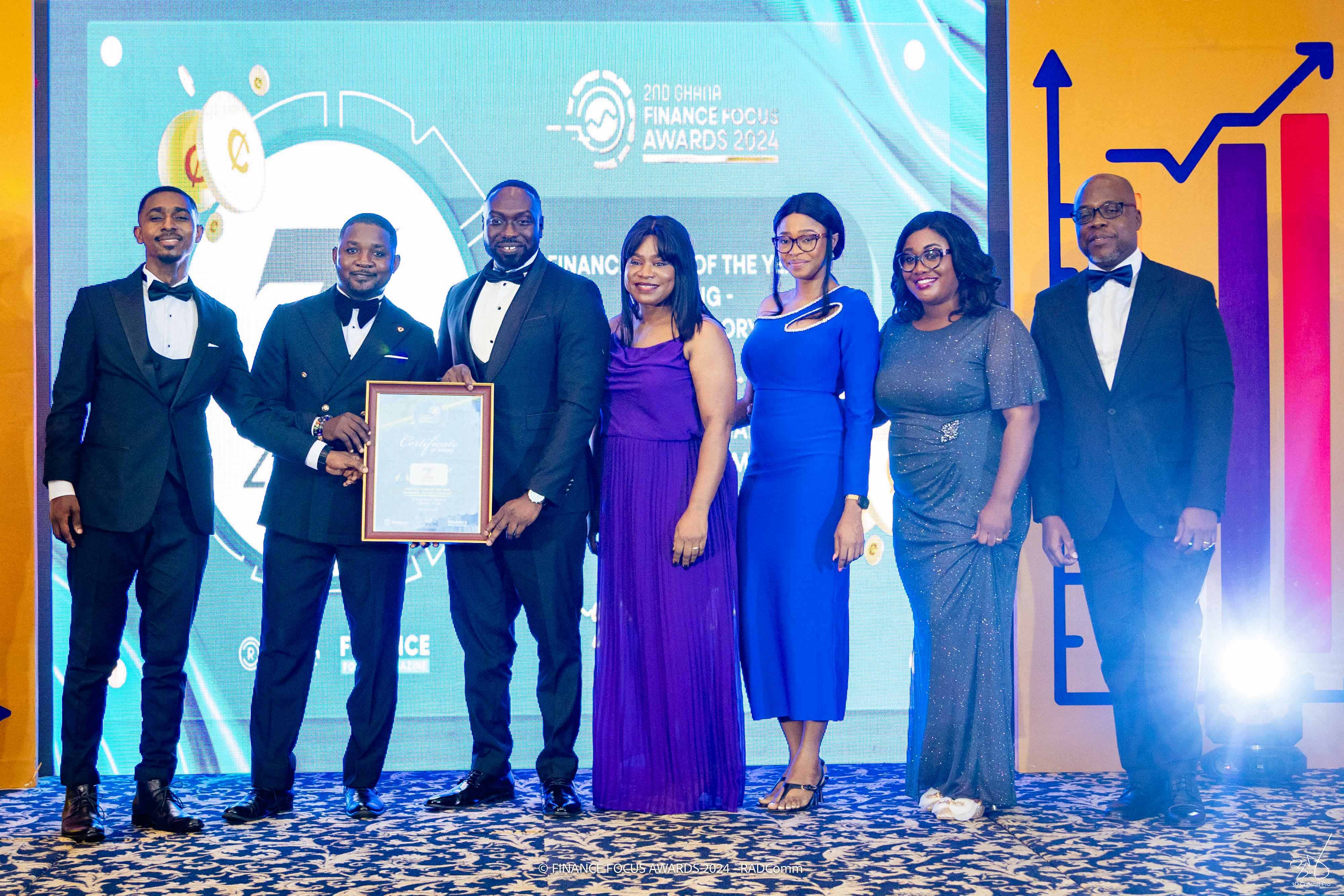 Award ceremony with executives on stage